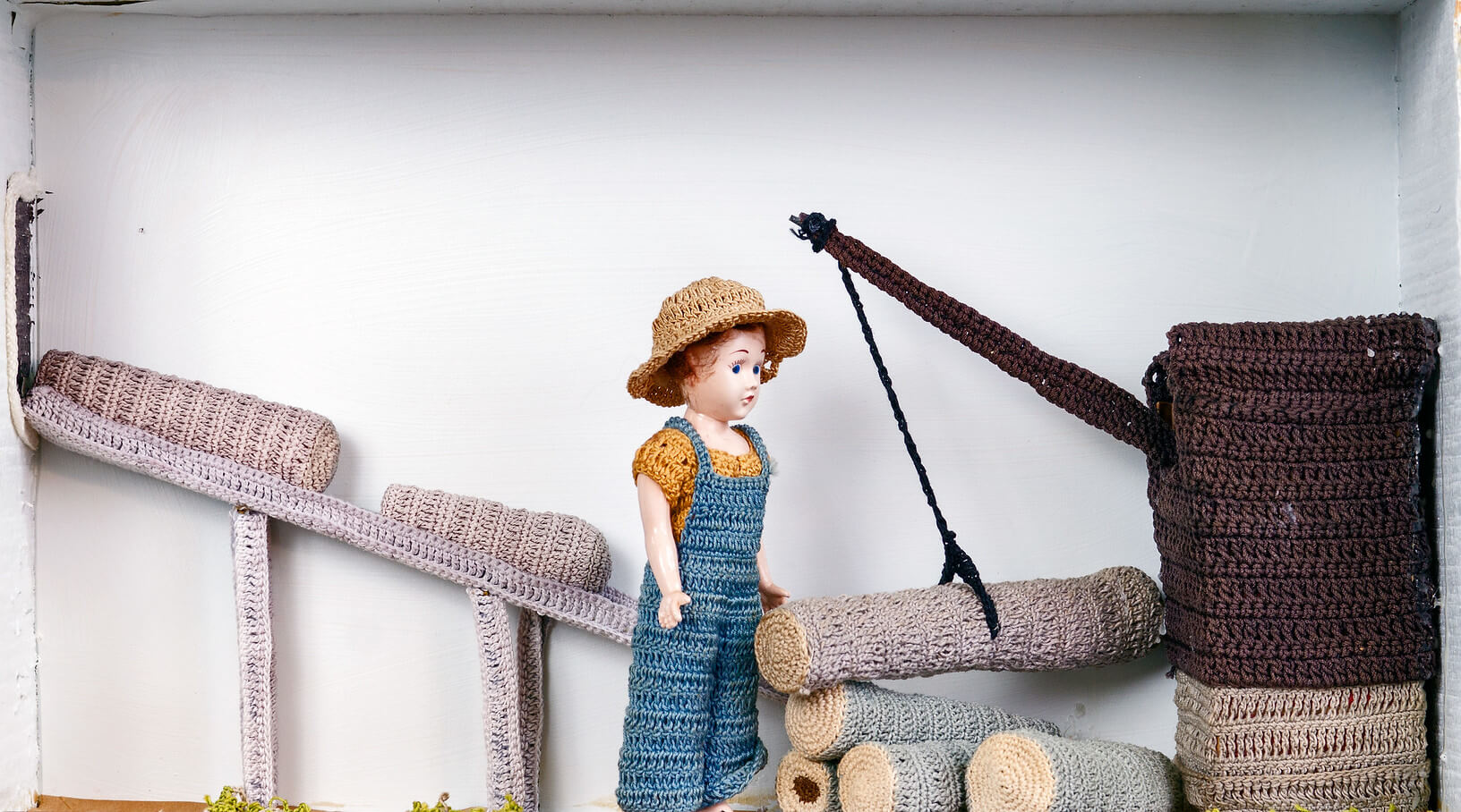 crocheted sawmill scene